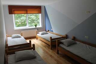 Хостелы Liepu Hostelis Лиепая Односпальная кровать в общем номере-1